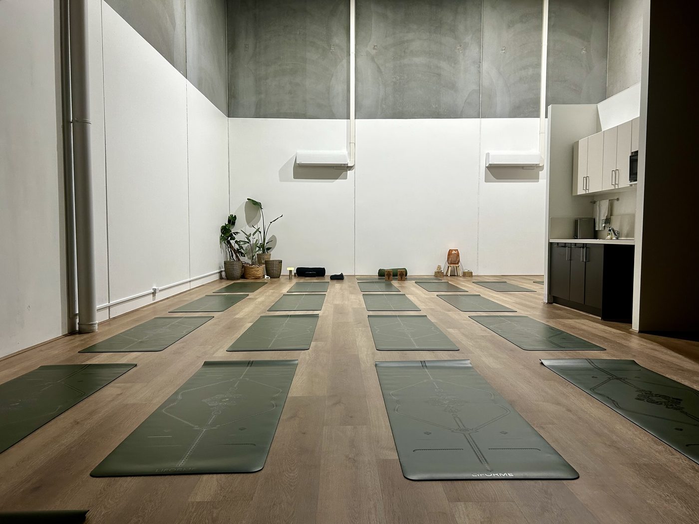 The Novara studio room with mats laid out